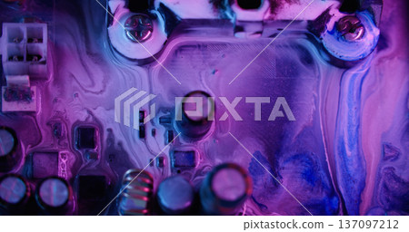 Paint spill. Circuit board. Defocused purple blue neon color vibrant microchip round texture bolt water on abstract electronic art background. Paint spill. Circuit board. Defocused purple blue neon color vibrant microchip round texture bolt water on abstract electronic art background. 137097212