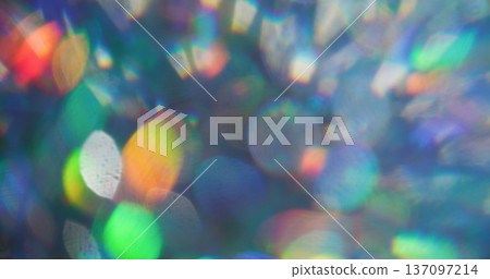 Defocused circles. Sparkling texture. Purple orange neon colorful round vibrant gleam radiant rainbow light on abstract bokeh art background. Defocused circles. Sparkling texture. Purple orange neon colorful round vibrant gleam radiant rainbow light on abstract bokeh art background. 137097214