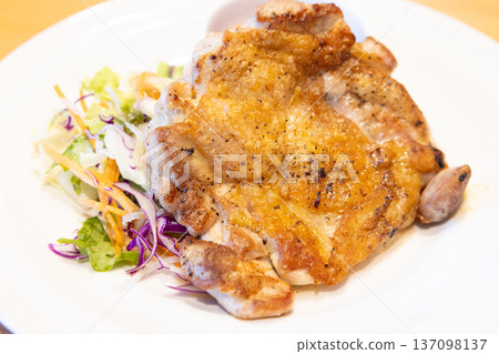 Delicious grilled young chicken Delicious grilled young chicken 137098137