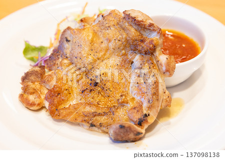 Delicious grilled young chicken Delicious grilled young chicken 137098138