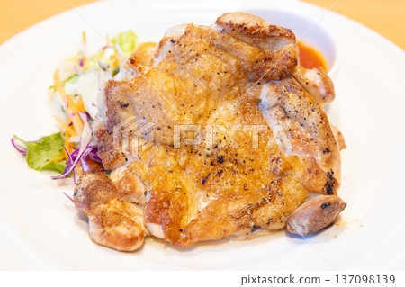 Delicious grilled young chicken Delicious grilled young chicken 137098139