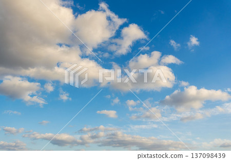 Winter evening blue sky and shining fluffy white clouds 42 Winter evening blue sky and shining fluffy white clouds 42 137098439