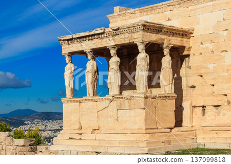 The Caryatid porch of Erechtheion (Erechtheum) or Temple of Athena Polias is an ancient Greek Ionic temple on the north side of the Acropolis in Athens, Greece 137099818