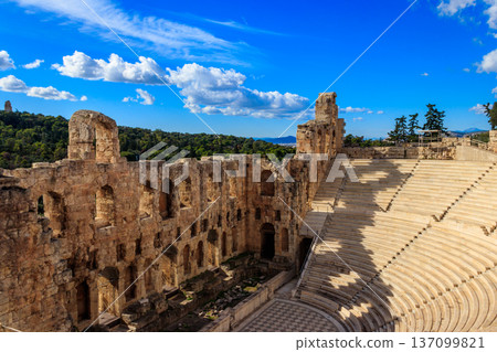 Odeon of Herodes Atticus is a stone Roman theatre structure located on the southwest slope of the Acropolis of Athens, Greece Odeon of Herodes Atticus is a stone Roman theatre structure located on the southwest slope of the Acropolis of Athens, Greece 137099821