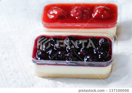 strawberry cheese cake , strawberry cheese pie or strawberry cheesecake and blueberry cheesecake with blueberry in the box strawberry cheese cake , strawberry cheese pie or strawberry cheesecake and blueberry cheesecake with blueberry in the box 137100098