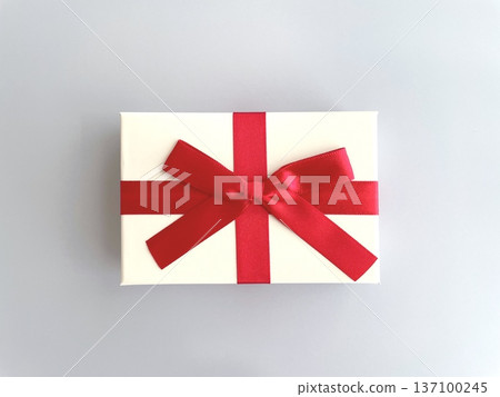 A red ribbon gift A red ribbon gift 137100245