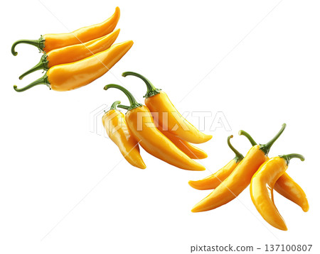 Fresh yellow chili peppers in various bunches, isolated on clean white background, concept of spicy food Fresh yellow chili peppers in various bunches, isolated on clean white background, concept of spicy food 137100807