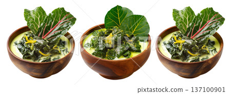 Rourou cooked taro leaves in creamy coconut milk, served in wooden bowl with garnishes, isolated on white background, Fiji cuisine 137100901