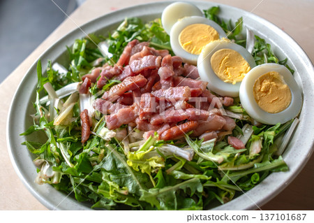 Dandelion salad with hard boiled eggs and bacon, diuretic, vitamin, healthy food Dandelion salad with hard boiled eggs and bacon, diuretic, vitamin, healthy food 137101687