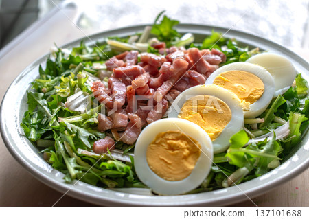 Dandelion salad with hard boiled eggs and bacon, diuretic, vitamin, healthy food Dandelion salad with hard boiled eggs and bacon, diuretic, vitamin, healthy food 137101688