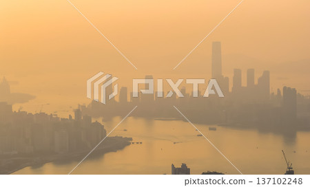 Golden Sunset Illuminates Victoria Harbour With Soothing Warm Light Feb 22 2026 137102248