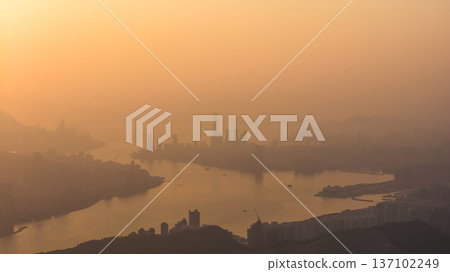 Golden Sunset Illuminates Victoria Harbour With Soothing Warm Light Feb 22 2026 137102249