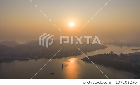 Golden Sunset Reflections Shimmer Beside Lei Yue Mun Coastline Feb 22 2026 137102250