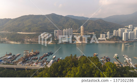 Scenic Hillside Coastline Blending Industry, Housing, And Natural Landscape Feb 21 2026 Scenic Hillside Coastline Blending Industry, Housing, And Natural Landscape Feb 21 2026 137102286