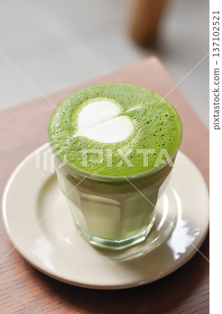 green tea or matcha latte , matcha green tea latte , milk green tea green tea or matcha latte , matcha green tea latte , milk green tea 137102521