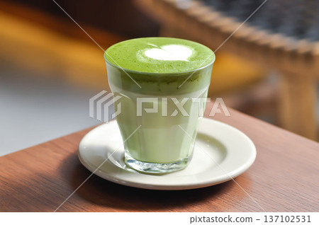green tea or matcha latte , matcha green tea latte , milk green tea green tea or matcha latte , matcha green tea latte , milk green tea 137102531