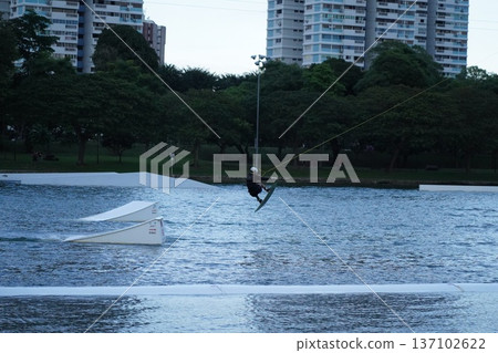 Wakeboarding Adventure Urban Landscape Lake Setting 137102622