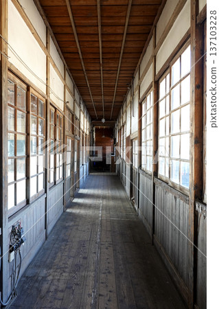 The interior of a retro wooden school building from a former elementary school on display at the roadside station 137103228