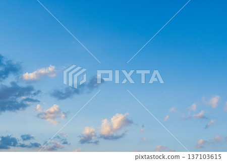 Winter evening blue sky and fluffy clouds 10 137103615