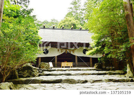 Tsubaki Grand Shrine, surrounded by fresh greenery, is Japan's oldest shrine. The main hall and the scenery of fresh greenery. A god of road opening. A tourist spot in Mie Prefecture. 137105159