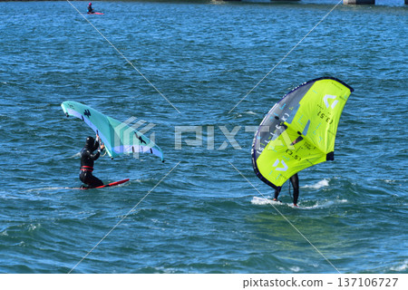 Kite surfer in strong winds Kite surfer in strong winds 137106727