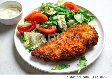Breaded Chicken with vegetable salad Breaded Chicken with vegetable salad 137106822