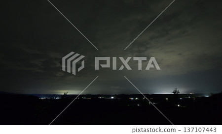 Fishing lights on the Sea of Okhotsk Fishing lights on the Sea of Okhotsk 137107443