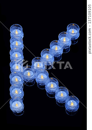 Blue candle alphabet K Blue candle alphabet K 137109105