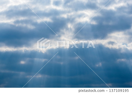 Winter sky seen from the mountains: Light shining through the gaps in the clouds 03 Winter sky seen from the mountains: Light shining through the gaps in the clouds 03 137109195