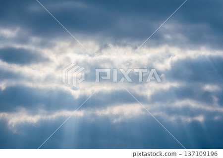 Winter sky seen from the mountains: Light shining through the gaps in the clouds 04 Winter sky seen from the mountains: Light shining through the gaps in the clouds 04 137109196