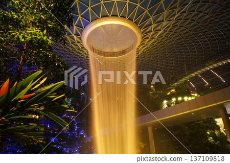 Jewel Changi Airport Rain Vortex with Lush Greenery 137109818