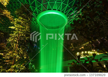 Spectacular Green Rain Vortex at Jewel Changi Airport Spectacular Green Rain Vortex at Jewel Changi Airport 137109820