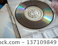 Stacked 8cm single CD discs, horizontal 137109849