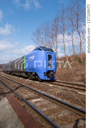 Hakodate Main Line: Kiha 281 series diesel railcar passing through the former Himekawa Station (2014) Hakodate Main Line: Kiha 281 series diesel railcar passing through the former Himekawa Station (2014) 137109975