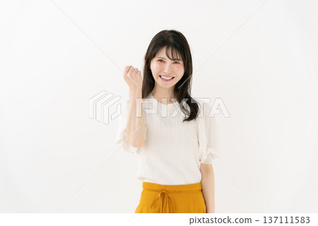Middle-aged woman portrait fist pump Middle-aged woman portrait fist pump 137111583