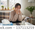 Woman suffering from hay fever 137113259