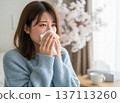 Woman blowing her nose 137113260