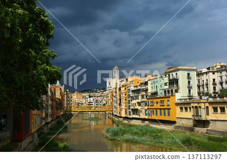 Girona City with Colorful Houses Along Onyar River Girona City with Colorful Houses Along Onyar River 137113297