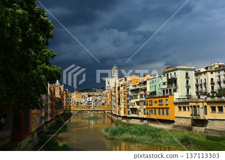 Girona City with Colorful Houses Along Onyar River Girona City with Colorful Houses Along Onyar River 137113303