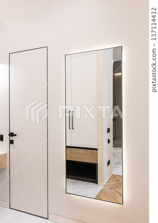 Minimal hallway mirror reflecting modern wardrobe Minimal hallway mirror reflecting modern wardrobe 137114412