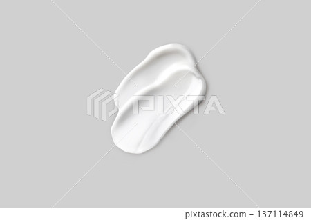 Swatch, smear of white cream. Face skin care, hand care, facial care. Isolated photo light gray background Swatch, smear of white cream. Face skin care, hand care, facial care. Isolated photo light gray background 137114849