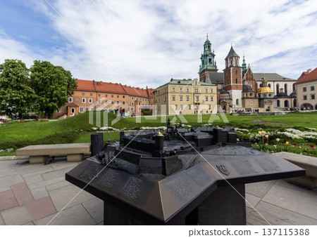 KRAKOW, POLAND - MAY 13, 2023: Wawel Cathedral on a sunny summer day against the background  137115388