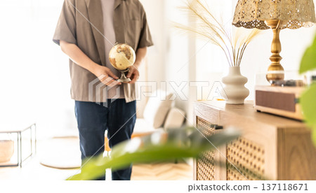 Man's room with a globe Man's room with a globe 137118671