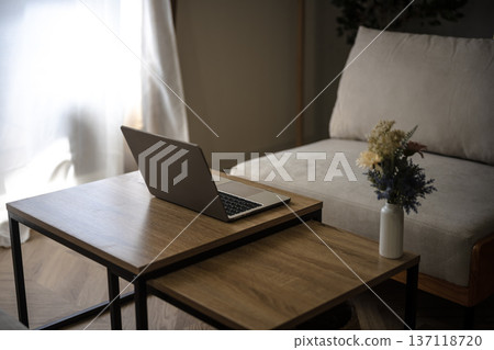 Living room table and laptop Living room table and laptop 137118720