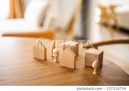 Wooden toys lined up on a desk Wooden toys lined up on a desk 137118734