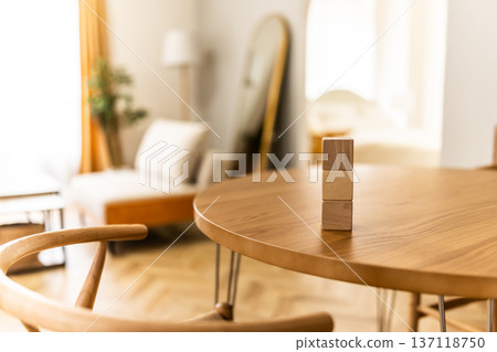 Building blocks piled up on a table Building blocks piled up on a table 137118750