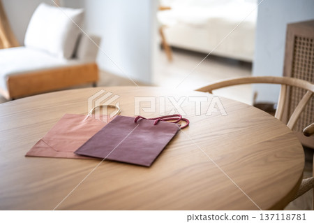 Paper bag on the table Paper bag on the table 137118781
