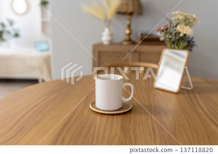 White mug on the table 137118820