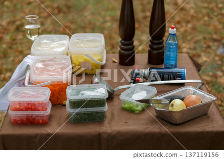 Ingredients arranged on picnic table outdoors Ingredients arranged on picnic table outdoors 137119156