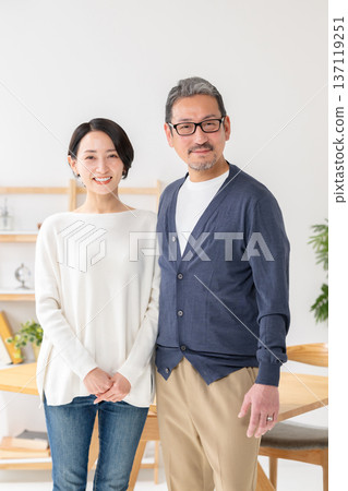 Middle married couple cuddling with smile 137119251